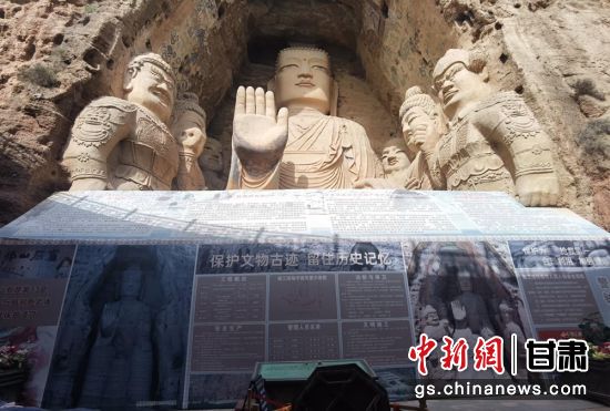 時(shí)下，中國“石窟鼻祖”天梯山石窟第13窟大佛足部與局部危巖體搶救性保護(hù)項(xiàng)目正在施工。圖為施工現(xiàn)場。陳曉斌 攝